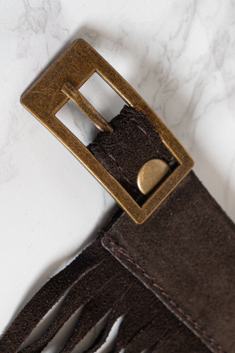 Cintura in pelle con frange