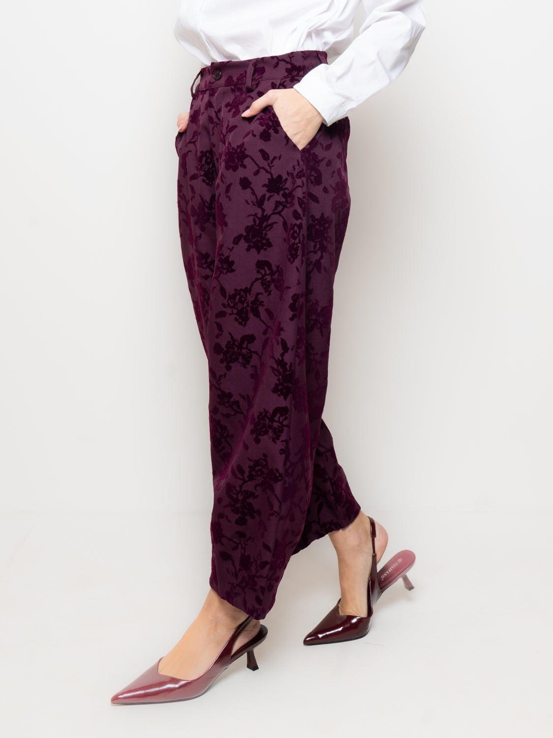 Pantalone in tessuto floreale devoré