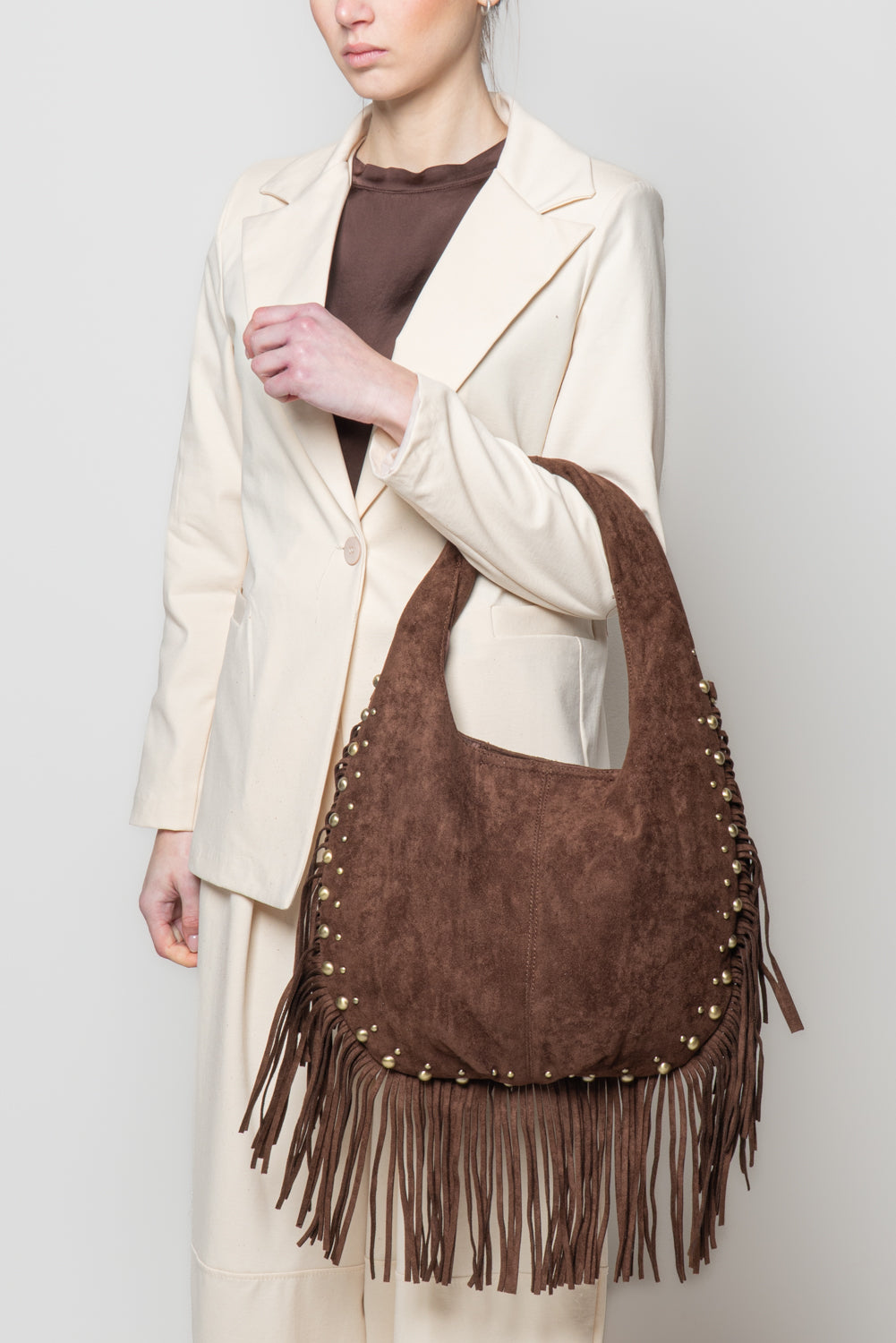 Borsa con frange e borchie