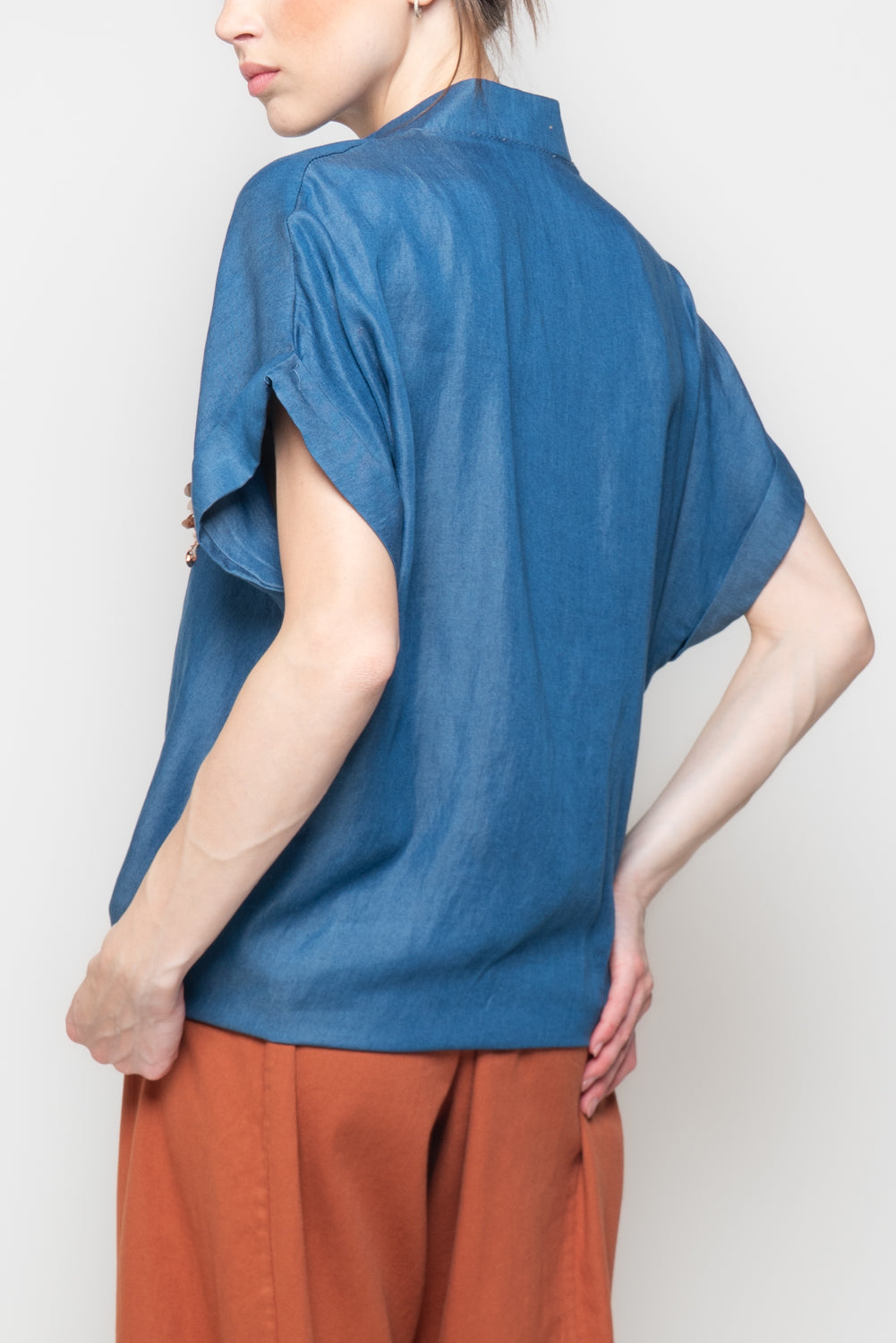 Camicia con tasca in paillettes