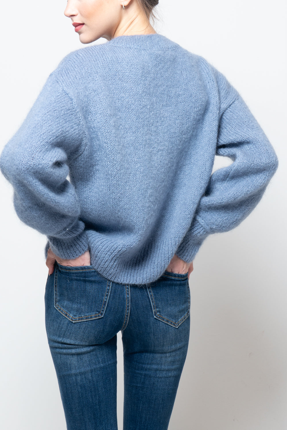 Maglia con pailettes sul polsino