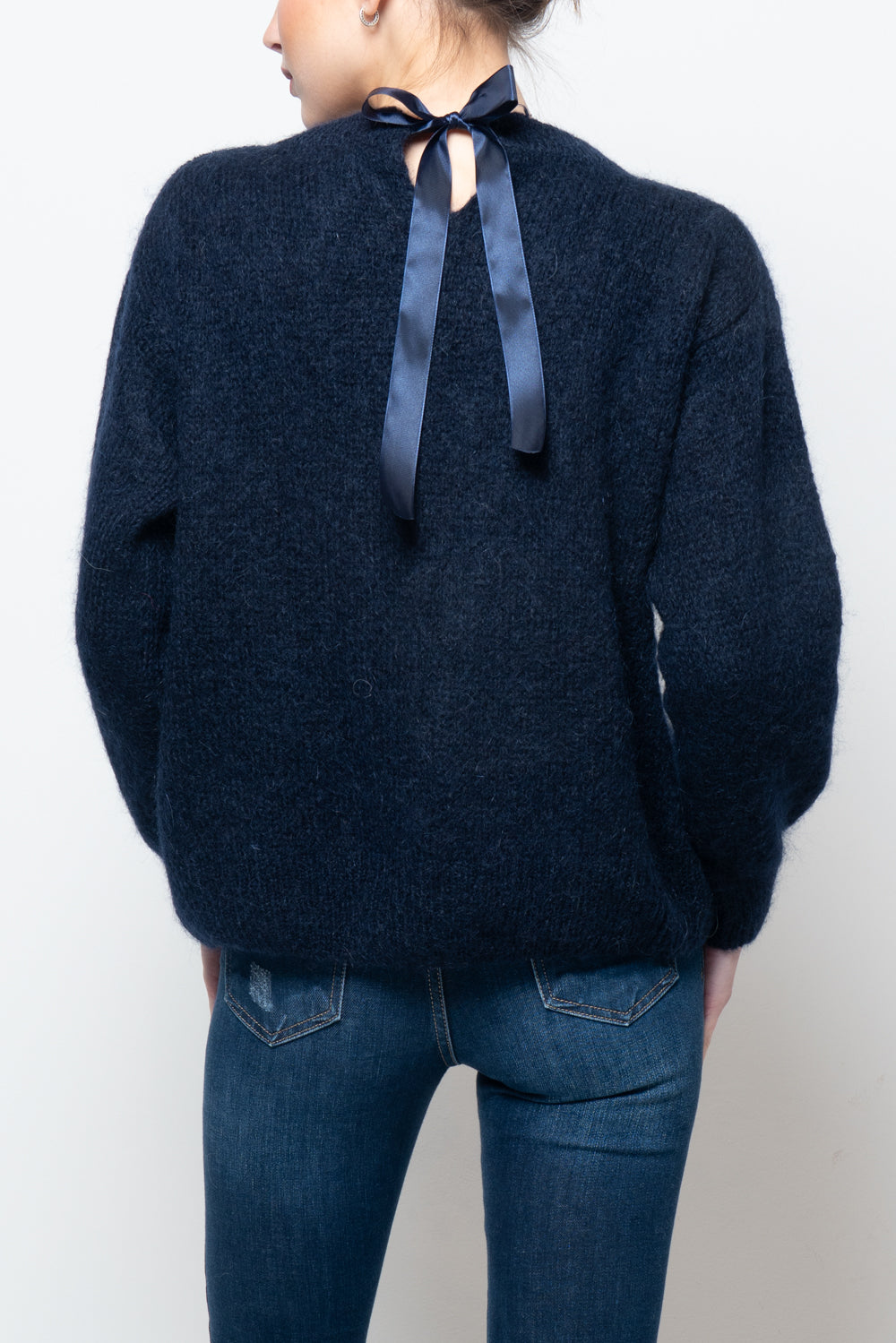 Maglia con fiocco dietro