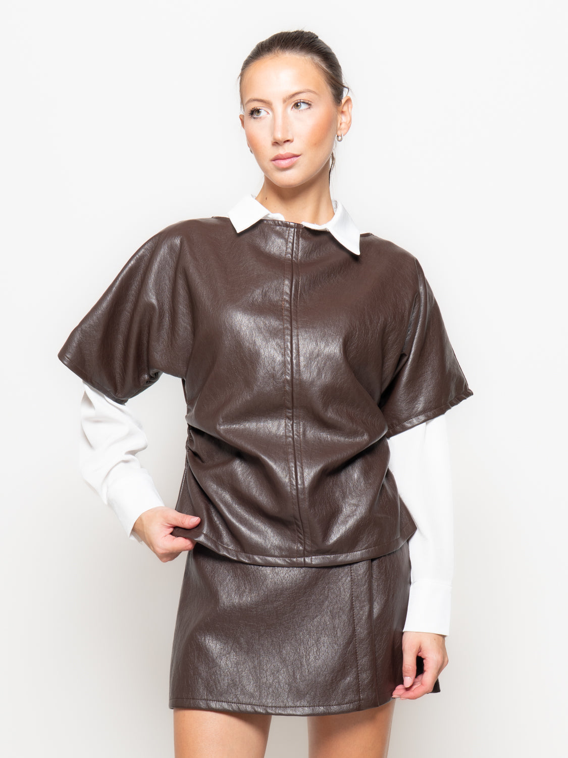 Blusa in similpelle rappresa