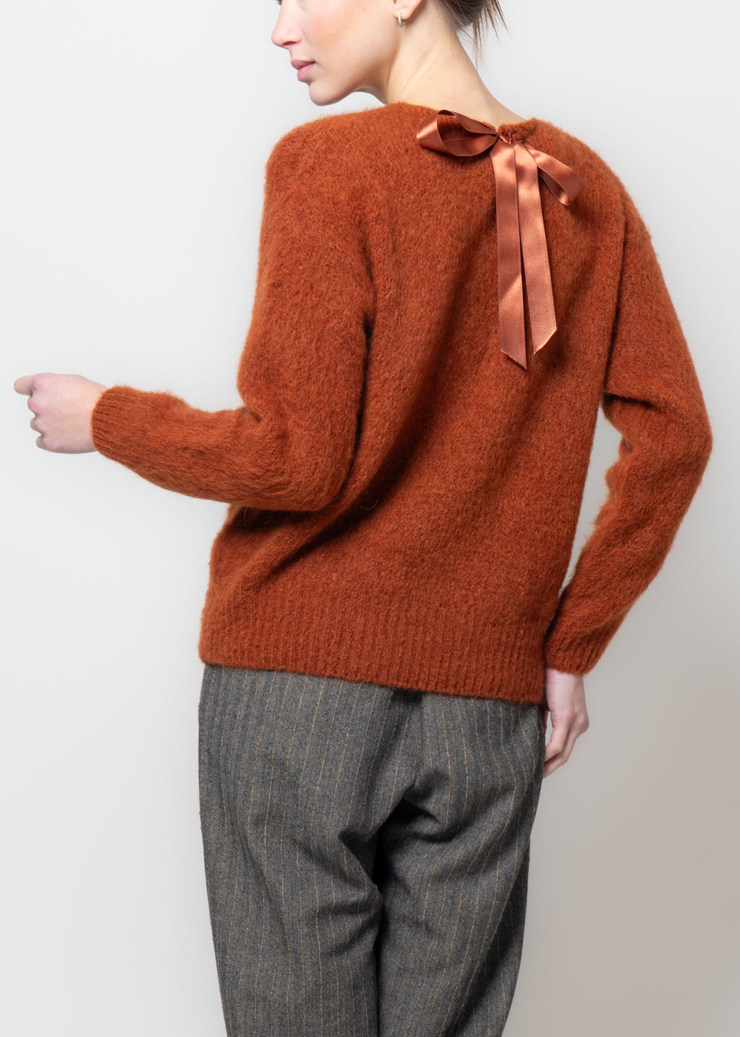 Maglia con fiocco dietro