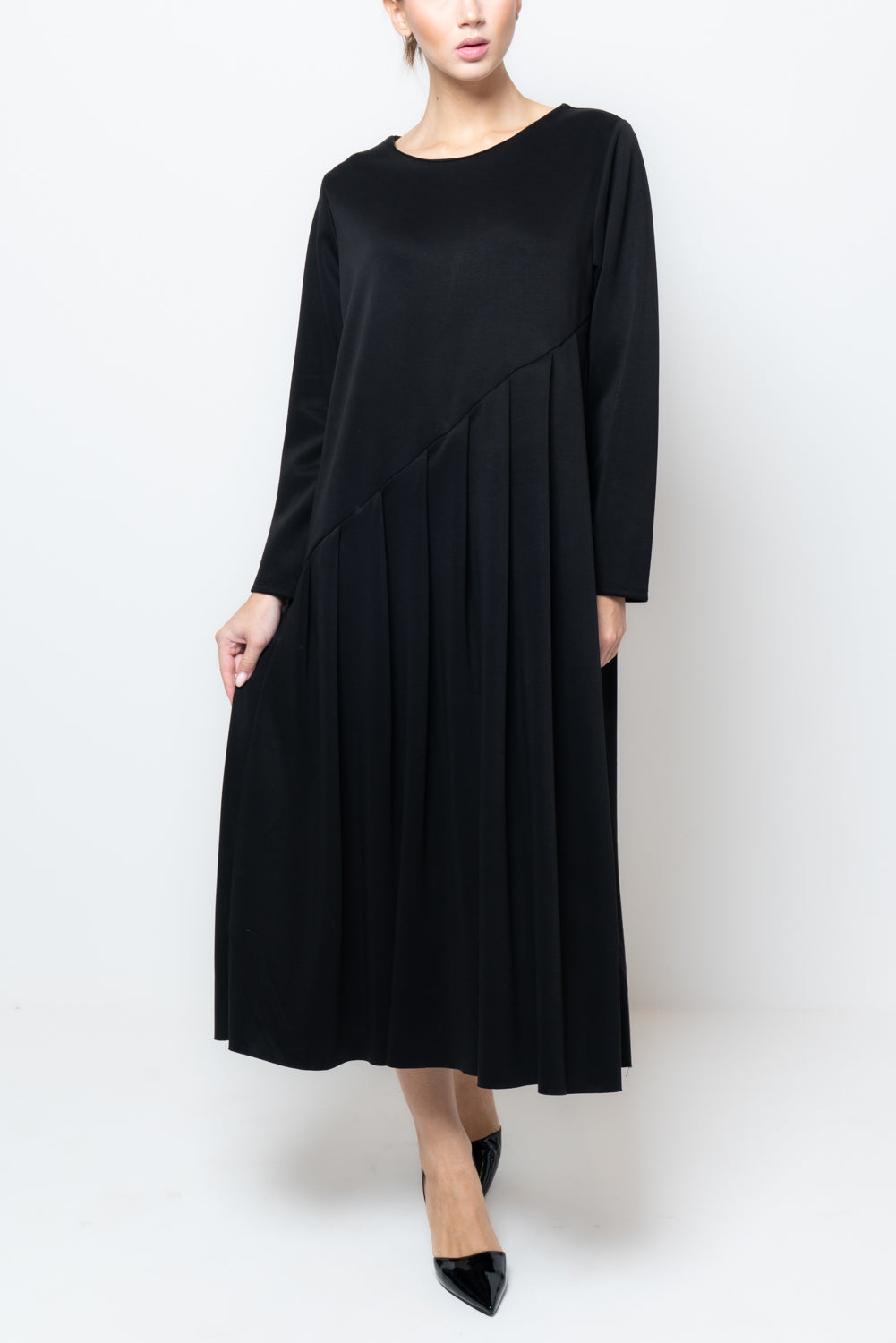 Abito ampio a pieghe