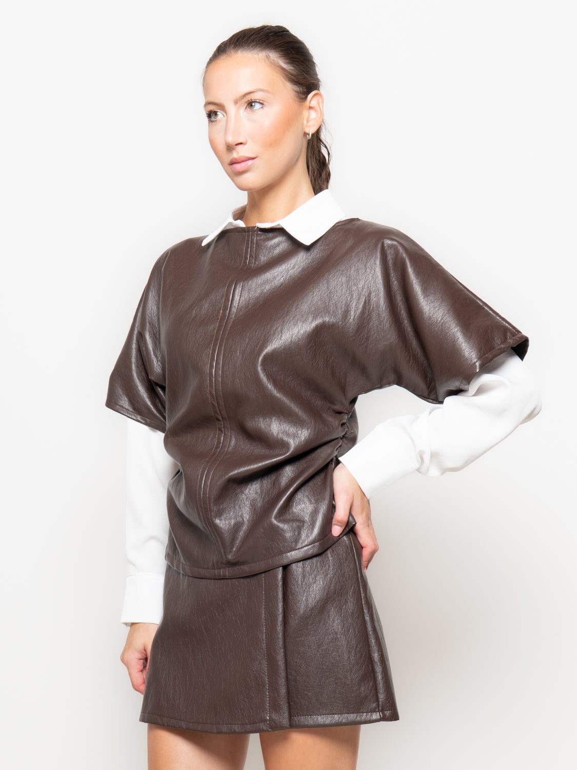 Blusa in similpelle rappresa