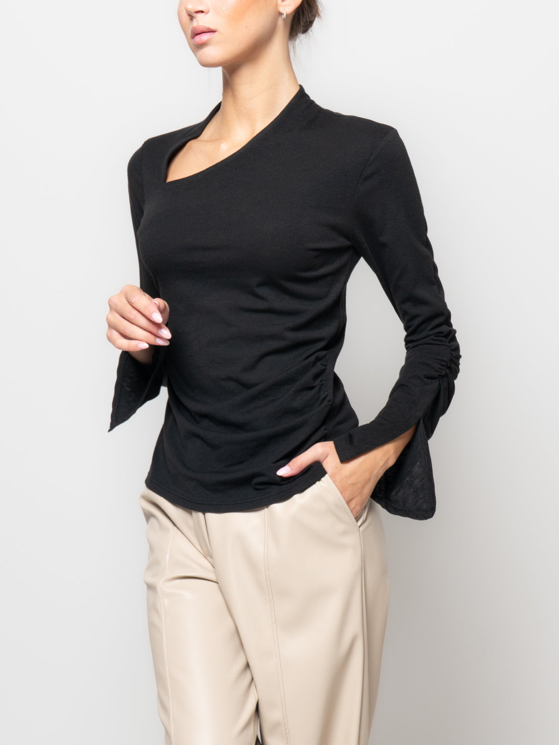 Maglia sollo asimmetrico