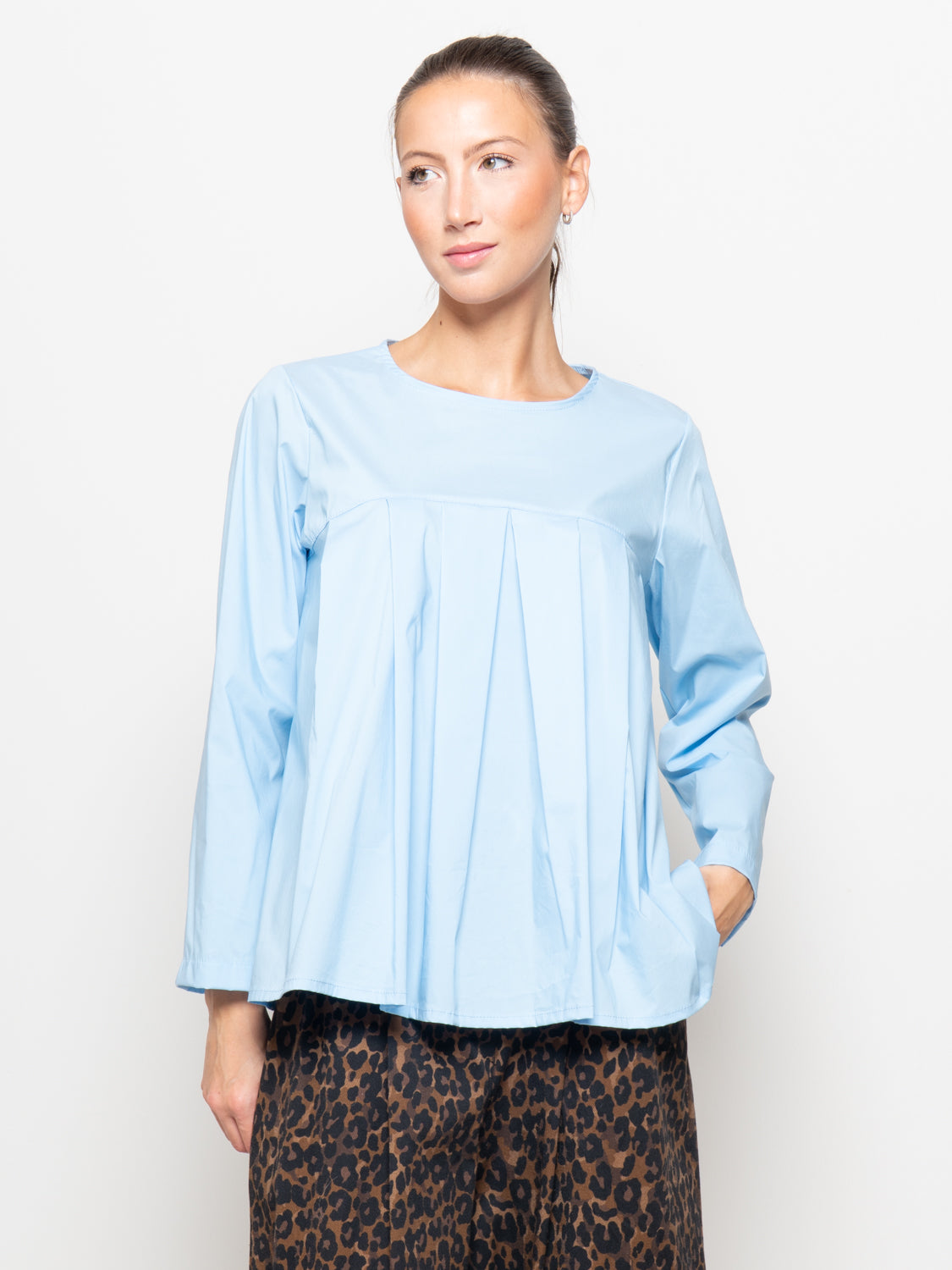 Blusa con pieghe